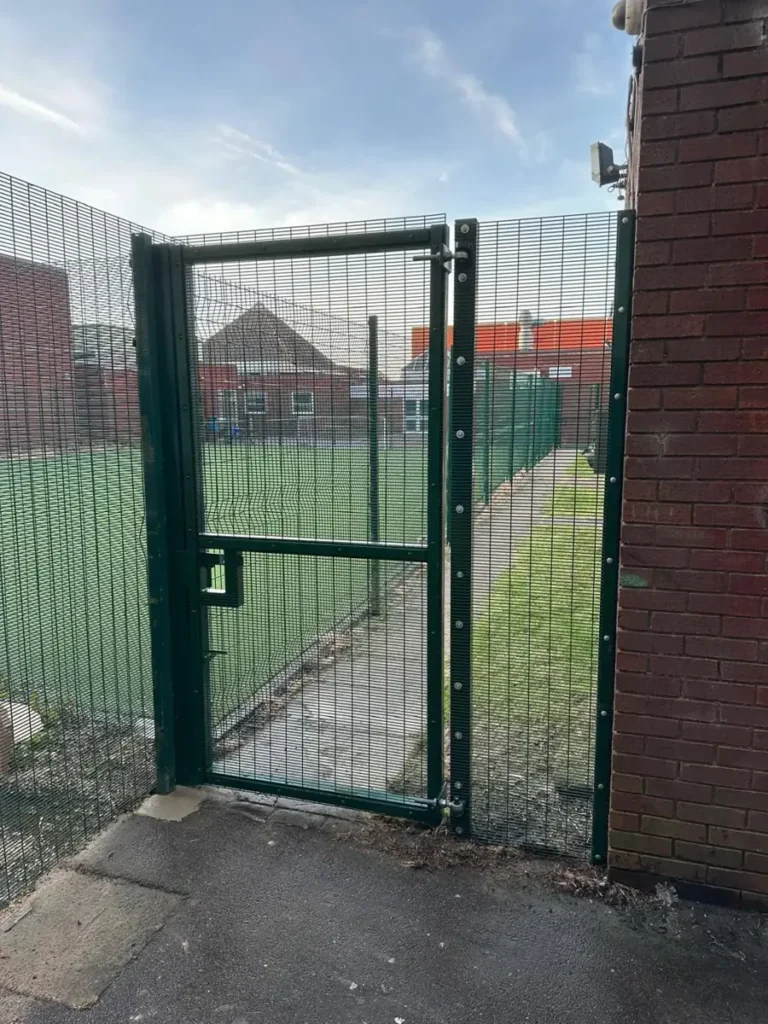 New green mesh security gate at the Academy of Central Bedfordshire in Houghton Regis